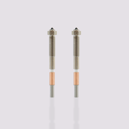 Two QIDI Tech Max4 bimetal nozzles with 0.4 mm markings
