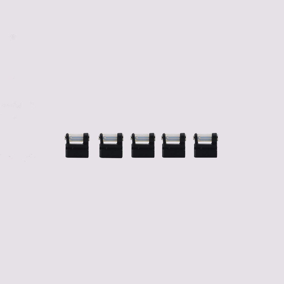 Five black Q2 nozzle wipers with transparent tubes arranged in a row on a white background.